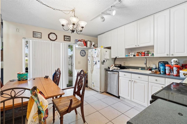 kitchen with dishwasher, white cabinets, a chandelier, and white refrigerator with ice dispenser