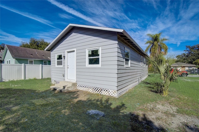 exterior space featuring a lawn