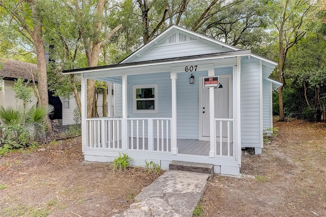 view of outbuilding with a porch