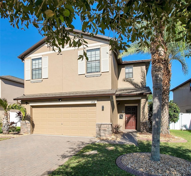 view of front of home with a garage