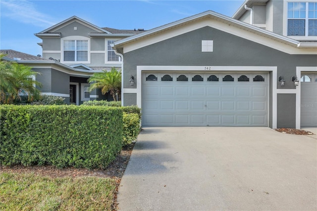 view of front of property with a garage