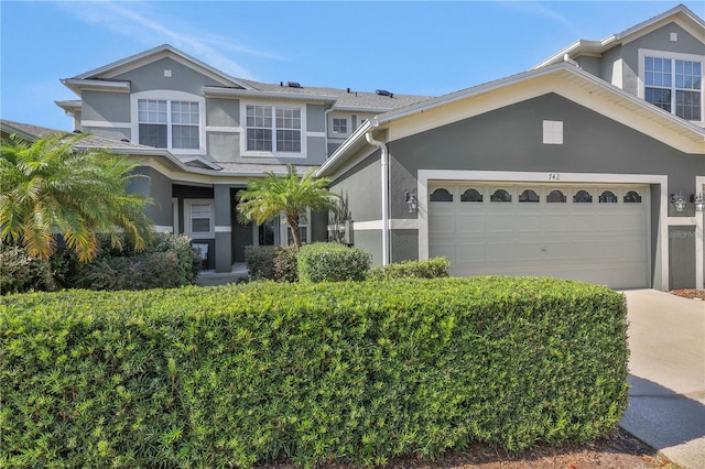 view of front of property featuring a garage