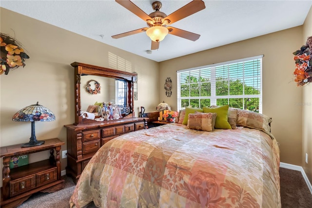 carpeted bedroom featuring ceiling fan