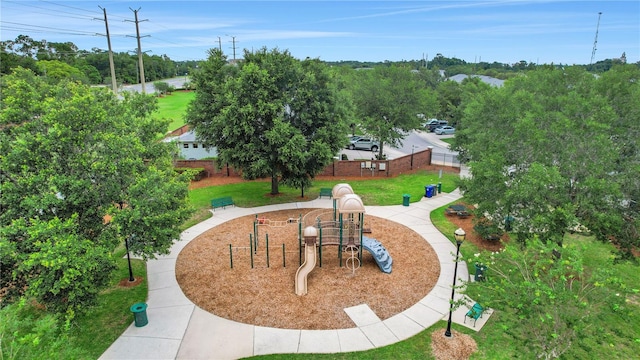 view of property's community featuring a playground