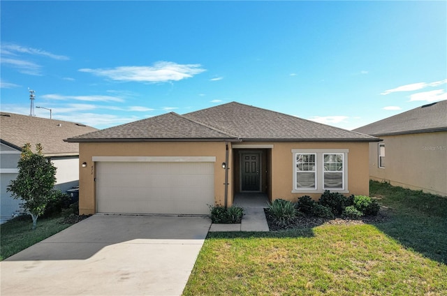 view of front facade featuring a front lawn and a garage