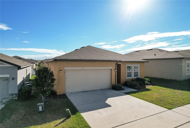 single story home featuring a front yard and a garage