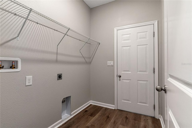 laundry area featuring washer hookup, dark hardwood / wood-style floors, and electric dryer hookup