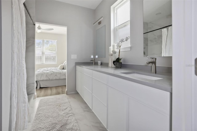 bathroom with vanity and ceiling fan