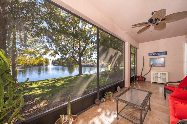 sunroom with a water view