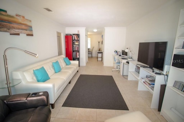 living room featuring light tile patterned flooring