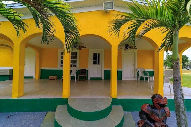 view of patio / terrace featuring ceiling fan