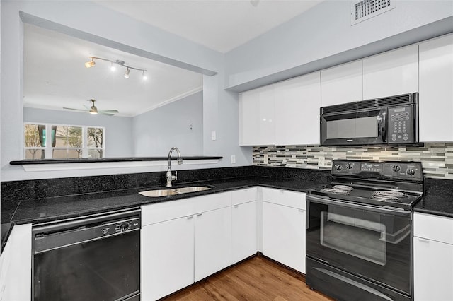 kitchen with white cabinetry, ceiling fan, sink, and black appliances