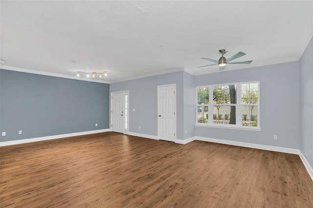 unfurnished room with ceiling fan, wood-type flooring, and crown molding