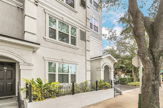 204 E S St Unit 1055, Orlando, FL 32801 - doorway to property featuring stucco siding