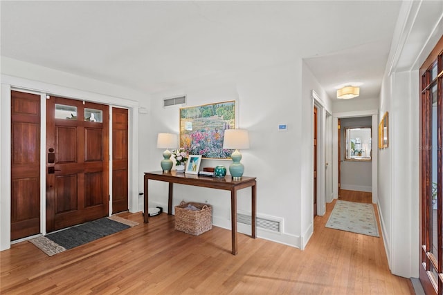 foyer entrance featuring light hardwood / wood-style floors