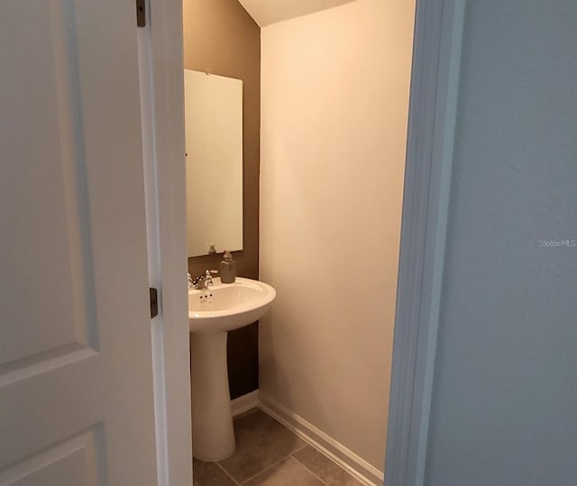 bathroom featuring tile patterned flooring