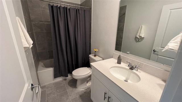 full bathroom featuring toilet, shower / tub combo with curtain, vanity, and tile patterned flooring