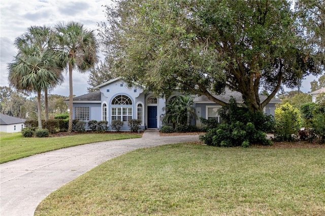 view of front of home with a front yard