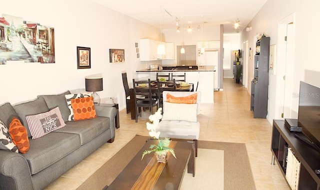 living room with light tile patterned floors