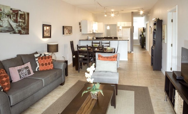 tiled living room with track lighting