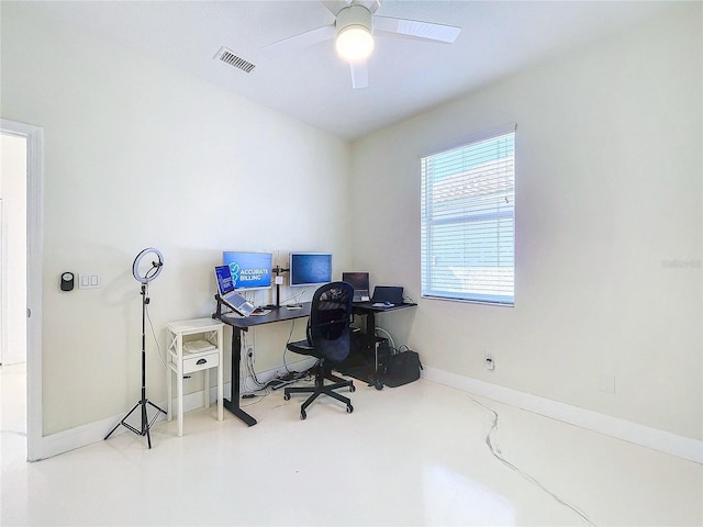 office space with concrete flooring and ceiling fan