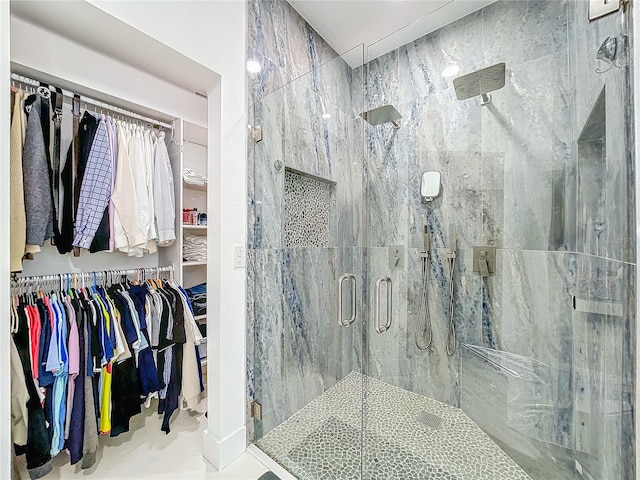 bathroom featuring an enclosed shower