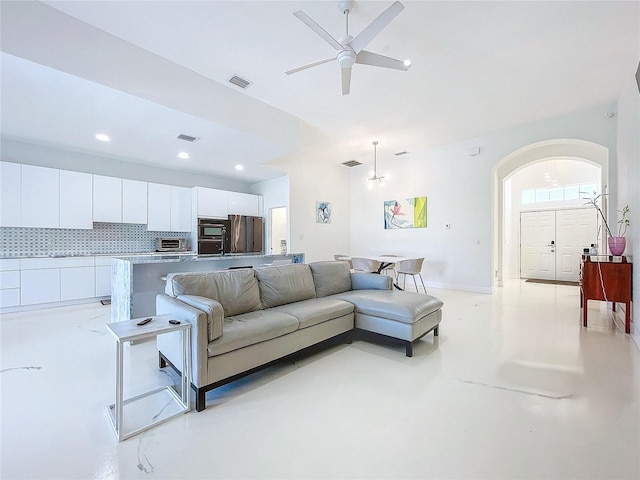 living room with ceiling fan