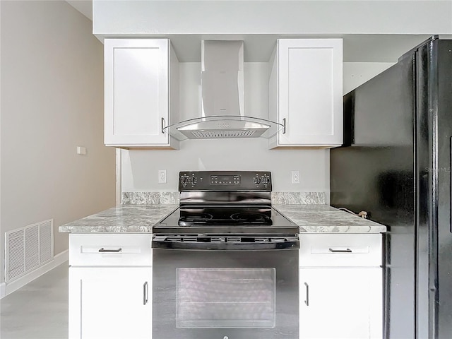 kitchen with white cabinets, wall chimney exhaust hood, and black appliances