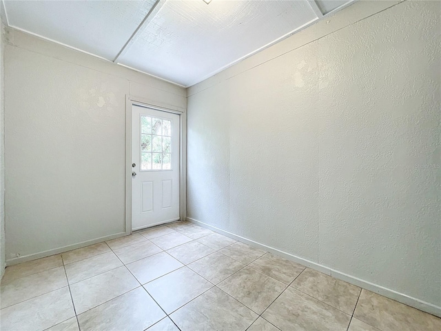 interior space featuring light tile patterned flooring