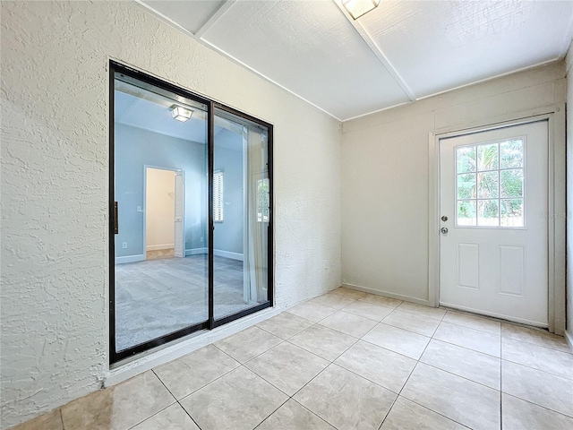 interior space featuring light tile patterned floors