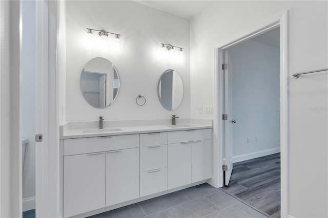 bathroom featuring vanity and tile patterned flooring