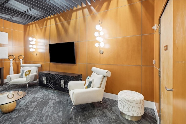 living area with hardwood / wood-style flooring