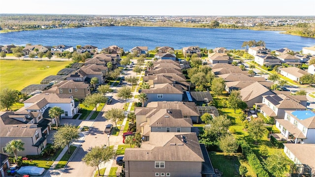 bird's eye view with a water view