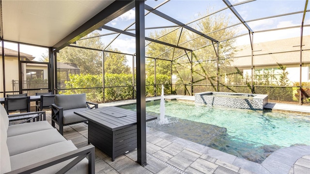 view of swimming pool with a lanai, an outdoor hangout area, pool water feature, a patio area, and an in ground hot tub