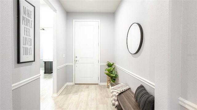 doorway with light hardwood / wood-style flooring