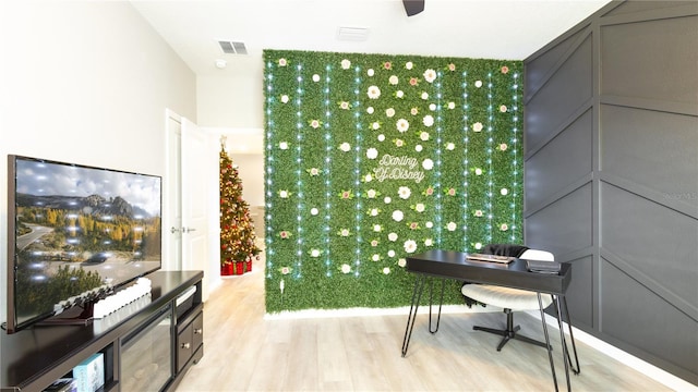 home office featuring light hardwood / wood-style floors