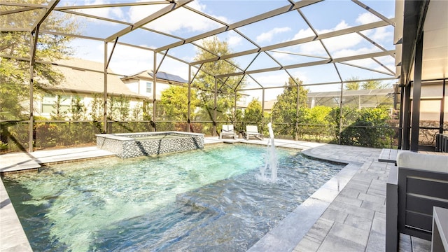 view of swimming pool featuring glass enclosure, an in ground hot tub, a patio area, and pool water feature