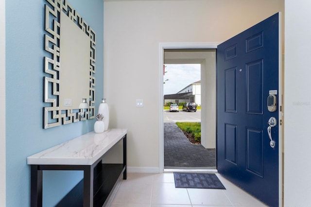 entrance foyer featuring light tile patterned floors