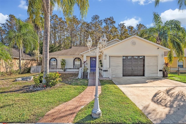 single story home with a garage and a front yard