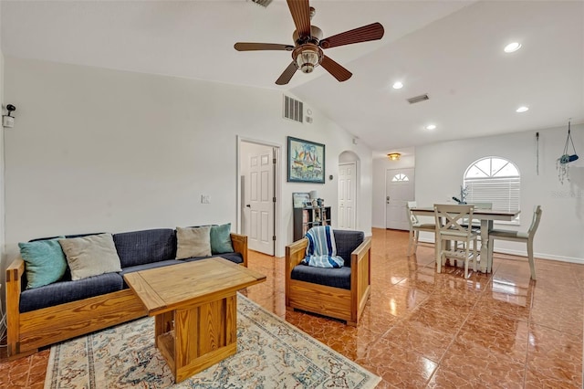 living room with ceiling fan and lofted ceiling