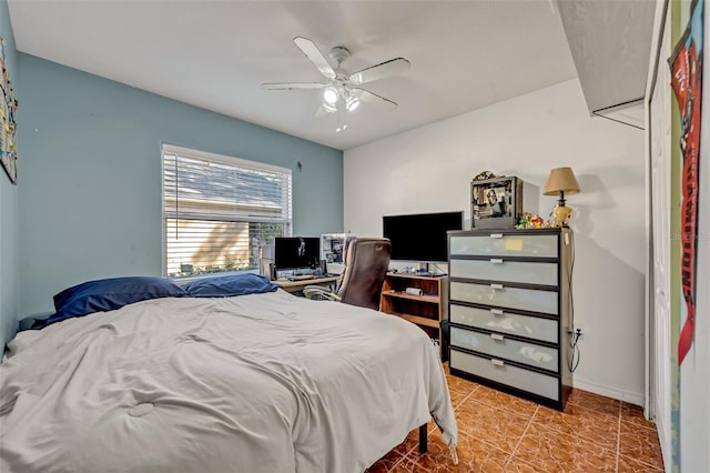 tiled bedroom with ceiling fan