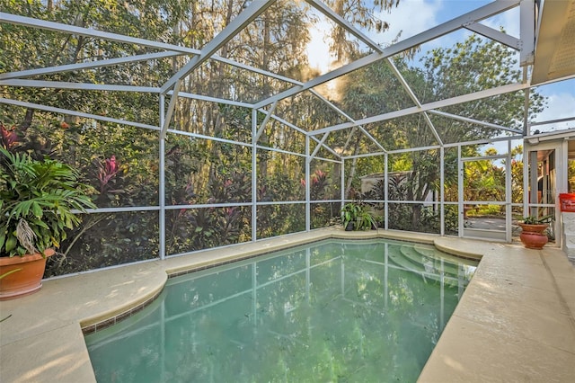 view of pool featuring a lanai and a patio area