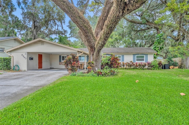 ranch-style house with a front lawn and a carport