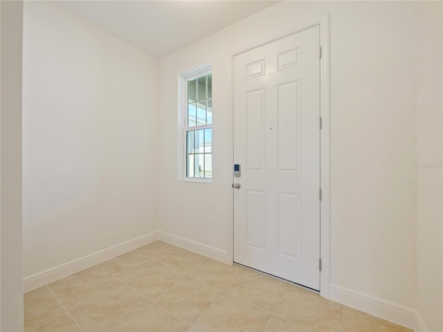 view of tiled foyer entrance