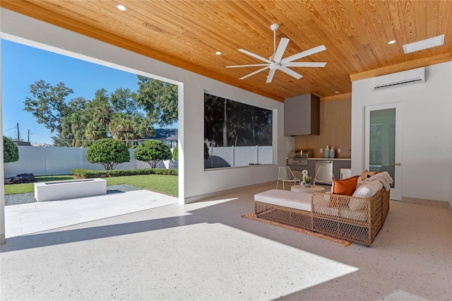 living area featuring a skylight, a ceiling fan, wood ceiling, an AC wall unit, and recessed lighting