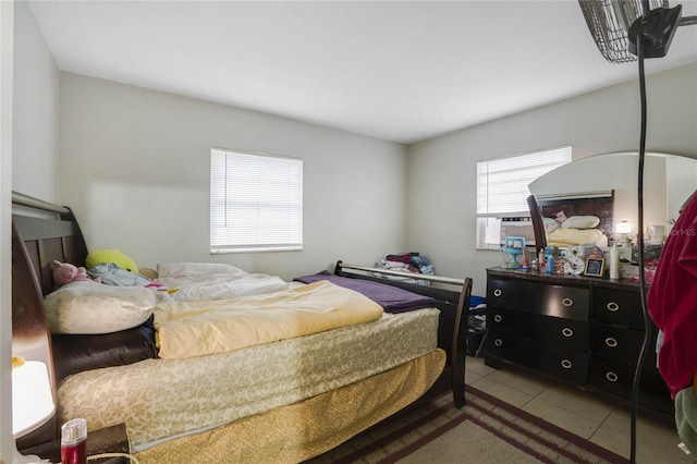 bedroom with light tile patterned flooring