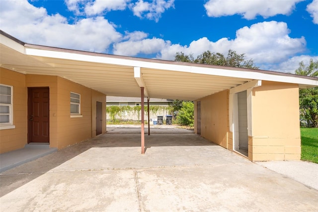 view of parking featuring a carport