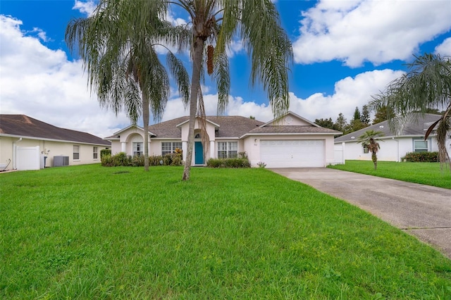 single story home with central AC unit, a front yard, and a garage