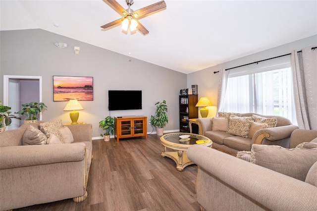 living room featuring hardwood / wood-style flooring, vaulted ceiling, and ceiling fan