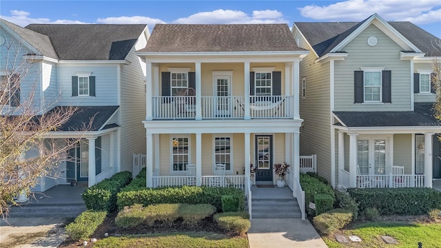 view of front facade featuring a porch and a balcony